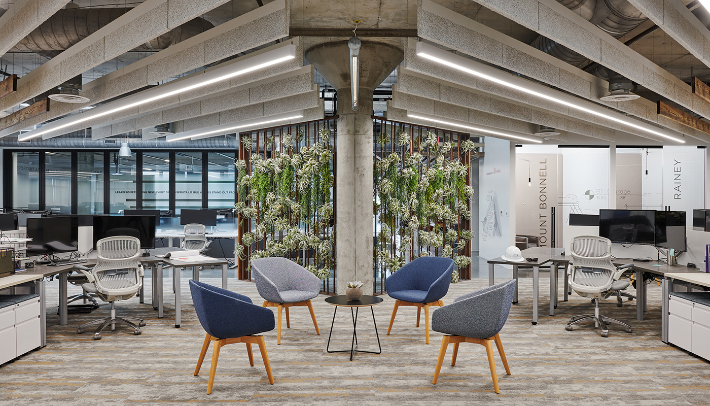 Creating Healthy Spaces Living wall inside of DPR's Austin office space, surrounded by chairs and desks.