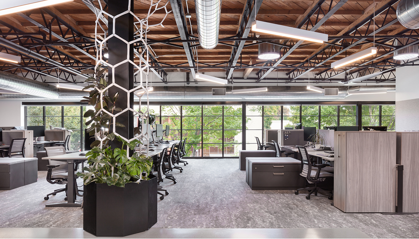 Building for Resilience in Workspaces. DPR's Sacramento office with spaced-out workstations and daylighting.